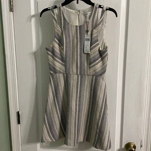 BCBG Cute dress with cut out on shoulders. Length 33” Size 4